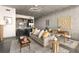 Open concept living room and kitchen with modern decor and natural light at 480 John Wesley Dobbs Ne Ave # 716, Atlanta, GA 30312