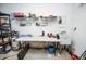 Bright garage with shelving, sink and work area at 6450 Oak Valley Dr, Cumming, GA 30040