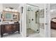 Stylish bathroom features a glass shower enclosure and elegant vanity at 8030 Eagle Lake Vw, Cumming, GA 30028