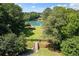 The picturesque community pond, complete with a gazebo, offers a tranquil retreat for residents at 8030 Eagle Lake Vw, Cumming, GA 30028