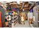 Organized storage room with shelving units, storage boxes, and appliances, offering ample space for household items at 8030 Eagle Lake Vw, Cumming, GA 30028