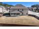 Large backyard with fencing, with an included screened in porch area at 975 Matt Springs Ct, Lawrenceville, GA 30045