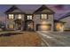 Stately brick home with a three-car garage and well-manicured lawn at 975 Matt Springs Ct, Lawrenceville, GA 30045