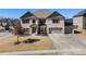 Charming brick home with a well-manicured lawn and a three-car garage at 975 Matt Springs Ct, Lawrenceville, GA 30045