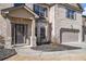 Welcoming front entrance showcasing a stylish door and a well-maintained landscape at 975 Matt Springs Ct, Lawrenceville, GA 30045