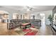 Spacious living room featuring hardwood floors and arched doorways at 975 Matt Springs Ct, Lawrenceville, GA 30045