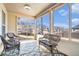 Relaxing sunroom with ample natural light and views of the backyard at 975 Matt Springs Ct, Lawrenceville, GA 30045