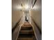 Hallway with carpeted stairs at 1727 Walt Stephens Rd, Jonesboro, GA 30236