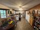 Eat-in kitchen with white cabinetry, stainless steel appliances, and a dining area at 1727 Walt Stephens Rd, Jonesboro, GA 30236
