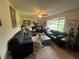 Cozy living room with large windows and ample seating at 1727 Walt Stephens Rd, Jonesboro, GA 30236