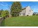 Expansive backyard with lush green grass and a privacy fence, perfect for outdoor activities at 5885 Waggoner Cv, Rex, GA 30273