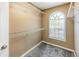 Walk-in closet featuring carpet floors, wire shelving, and natural light at 5885 Waggoner Cv, Rex, GA 30273