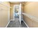 Walk-in closet features carpet flooring and wire shelves for easy storage at 5885 Waggoner Cv, Rex, GA 30273