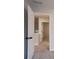 Second floor hall featuring neutral carpeting and paint at 2545 Davenport Park Dr, Duluth, GA 30096