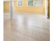 Open basement area boasts tile flooring, bright paint and natural light from two windows at 3188 Sunnyford Ln, Lithonia, GA 30038