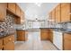 Functional kitchen featuring tile floors, and a breakfast area bathed in natural light at 3188 Sunnyford Ln, Lithonia, GA 30038