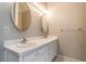 Bathroom featuring a double vanity with white countertops and modern sinks at 507 Matthew Dr, Canton, GA 30115