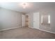 Bedroom with carpet, closet, and neutral walls at 507 Matthew Dr, Canton, GA 30115