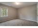 Neutral bedroom with carpet, natural light, and a closet at 507 Matthew Dr, Canton, GA 30115