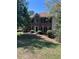 Traditional brick home with manicured front yard, dark shutters, and a symmetrical design at 507 Matthew Dr, Canton, GA 30115