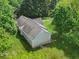 Birds eye view of a well maintained home with mature trees and landscaping at 5711 Parks Rd, Cumming, GA 30041