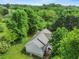 Aerial view of the home highlighting its peaceful, wooded setting at 5711 Parks Rd, Cumming, GA 30041