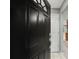 Inviting front door featuring a modern design and secure entry system at 5711 Parks Rd, Cumming, GA 30041