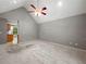 Spacious living room featuring carpeted floors, neutral walls, and a ceiling fan at 5711 Parks Rd, Cumming, GA 30041