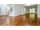 A spacious living room with hardwood floors and stairway at 6815 Fairgreen Dr, Suwanee, GA 30024