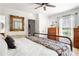 Spacious bedroom features a ceiling fan, hardwood floors, and lots of natural light at 812 E Ponce De Leon Ave, Decatur, GA 30030
