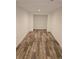 Open basement area featuring wood-look tile flooring and ample space at 2065 Verbena St, Atlanta, GA 30314
