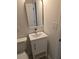 Bathroom vanity with modern sink, mirror, and fixtures at 2065 Verbena St, Atlanta, GA 30314
