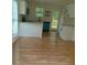 Bright kitchen with white cabinets, modern appliances, and plenty of natural light at 2065 Verbena St, Atlanta, GA 30314
