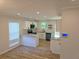 Contemporary kitchen featuring white cabinets, granite countertops and stainless steel appliances at 2065 Verbena St, Atlanta, GA 30314
