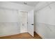 Walk-in closet featuring wood floors and wire shelving at 4725 Young Deer Dr, Cumming, GA 30041