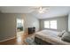 Spacious main bedroom with vaulted ceiling, electric fireplace and ensuite bathroom at 5070 Smithfield Rd, Bowdon, GA 30108