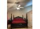 Cozy bedroom with dark wood furniture, a ceiling fan and recessed lighting at 1104 Aqua Shore Dr, Mcdonough, GA 30252