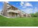 Backyard featuring a deck and a spacious lawn at 2539 Larson Creek Cove, Duluth, GA 30097