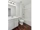 Bathroom with white vanity, toilet, and shower/tub combo at 2539 Larson Creek Cove, Duluth, GA 30097