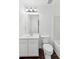 Bathroom with white vanity, toilet, and shower/tub combo at 2539 Larson Creek Cove, Duluth, GA 30097
