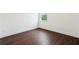 Bedroom with a window and hardwood floors at 2539 Larson Creek Cove, Duluth, GA 30097