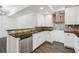 Bright kitchen featuring stainless steel appliances, white cabinets, and granite countertops at 2539 Larson Creek Cove, Duluth, GA 30097