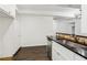 Kitchen featuring stainless steel appliances and white cabinets at 2539 Larson Creek Cove, Duluth, GA 30097