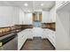 Updated kitchen featuring white cabinets, stainless steel appliances, and granite countertops at 2539 Larson Creek Cove, Duluth, GA 30097