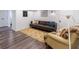 Finished basement with wood floors, modern furniture, and recessed lighting at 3046 Valley Cir, Decatur, GA 30033