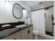 Contemporary bathroom boasting black fixtures, subway tile, and a sleek vanity at 3046 Valley Cir, Decatur, GA 30033
