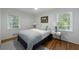 Bedroom featuring hardwood floors, ceiling fan, and natural light at 3046 Valley Cir, Decatur, GA 30033