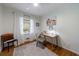 Bedroom featuring hardwood floors, ceiling fan, and natural light at 3046 Valley Cir, Decatur, GA 30033