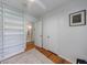 Bright bedroom with hardwood floors, built-in shelving, and modern decor at 3046 Valley Cir, Decatur, GA 30033