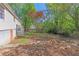 The backyard reveals a project in progress, with materials staged for landscaping or construction at 5942 Morgan Rd, Atlanta, GA 30340